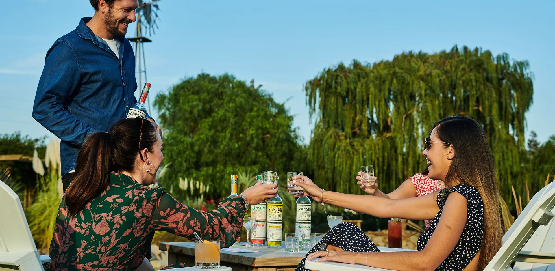 some friends enjoying cocktails in the sun