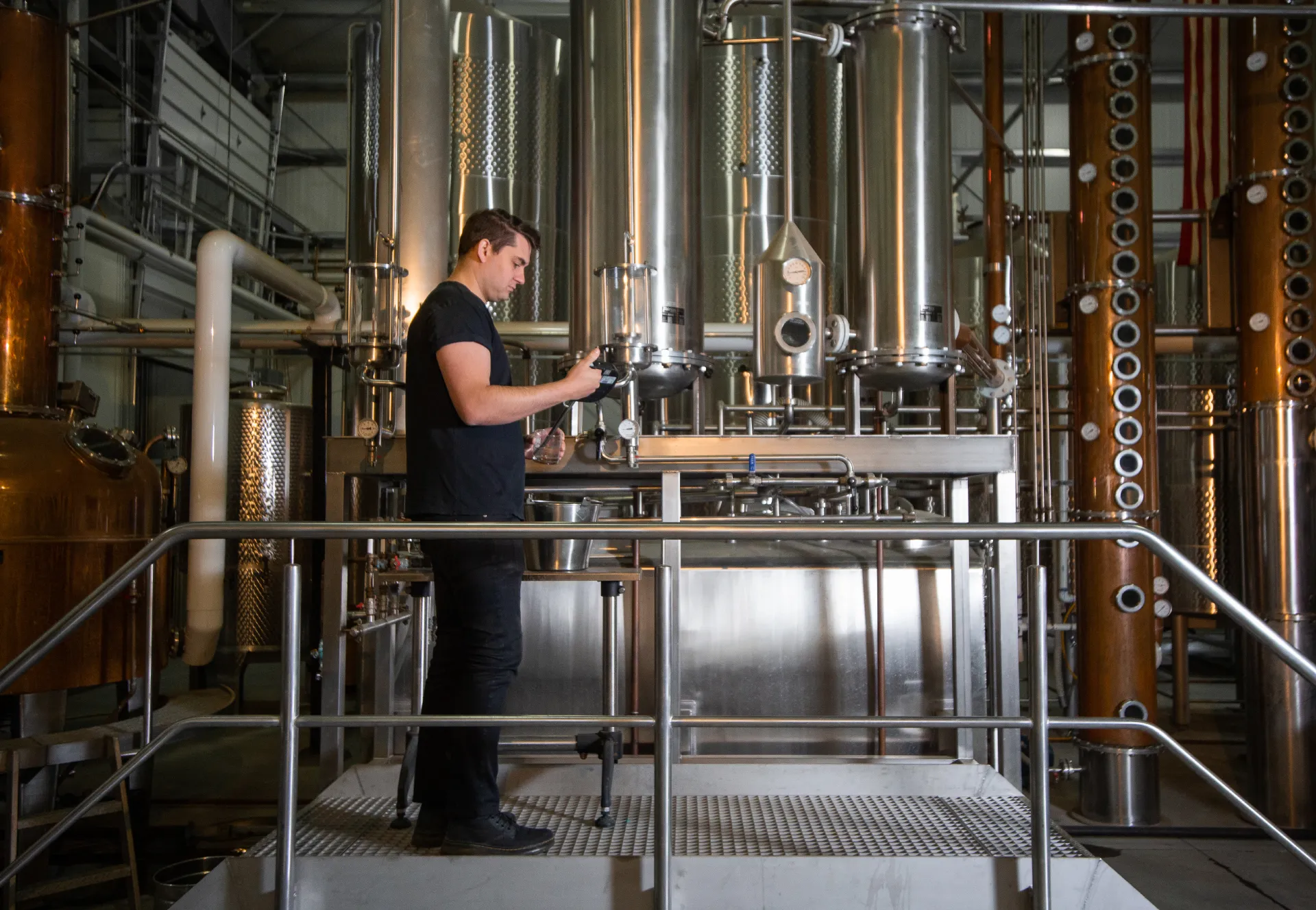 Darren Hanson checking the fermentation tanks