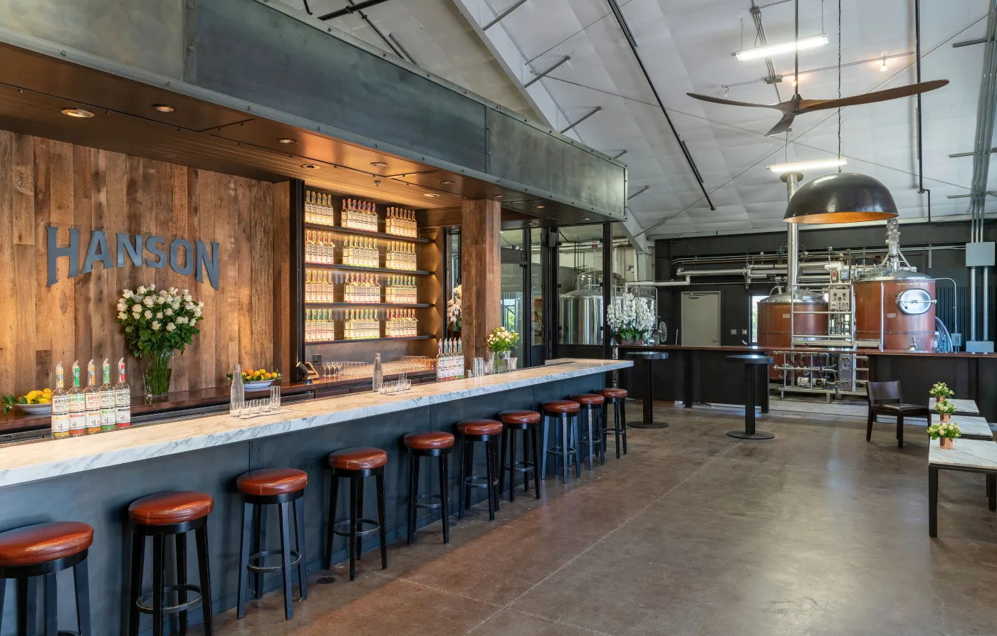 Sonoma tasting room with distillery in background